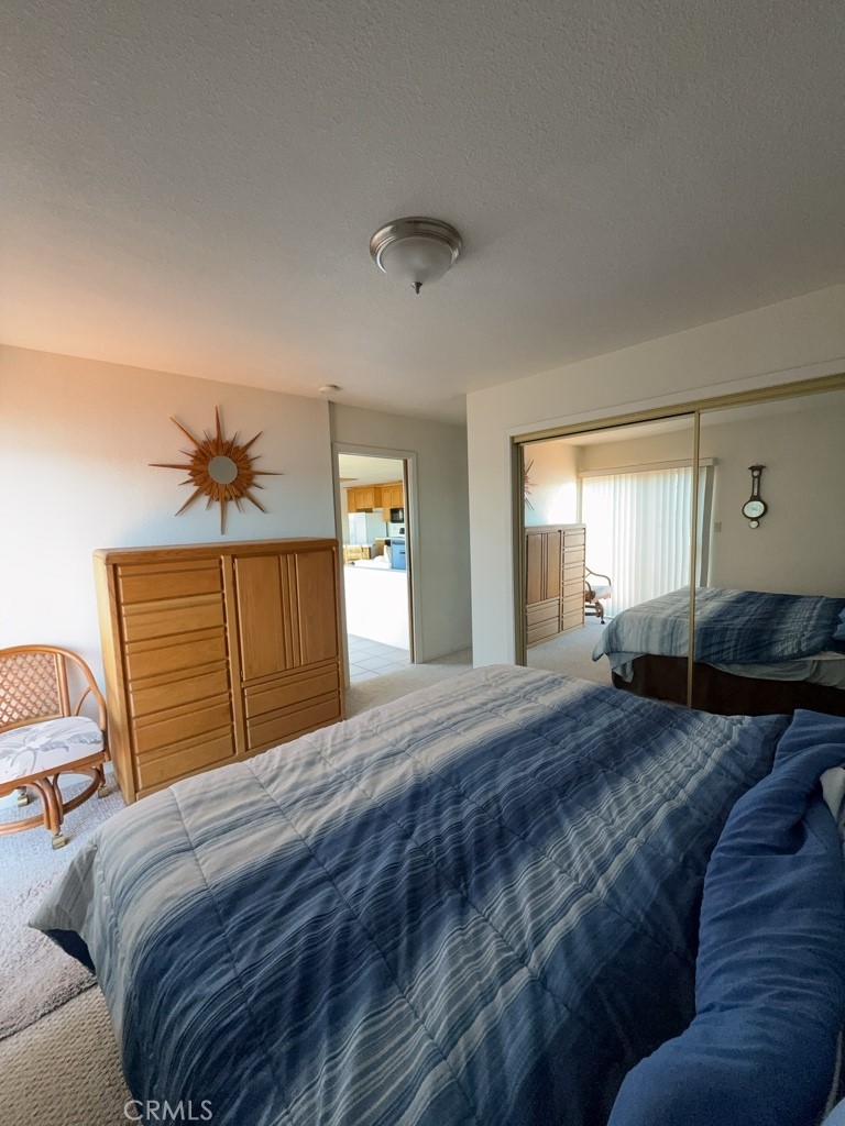 4816 Marina Drive Kelseyville, CA 95451 - Photo 14 of 28 a bedroom with a bed and window