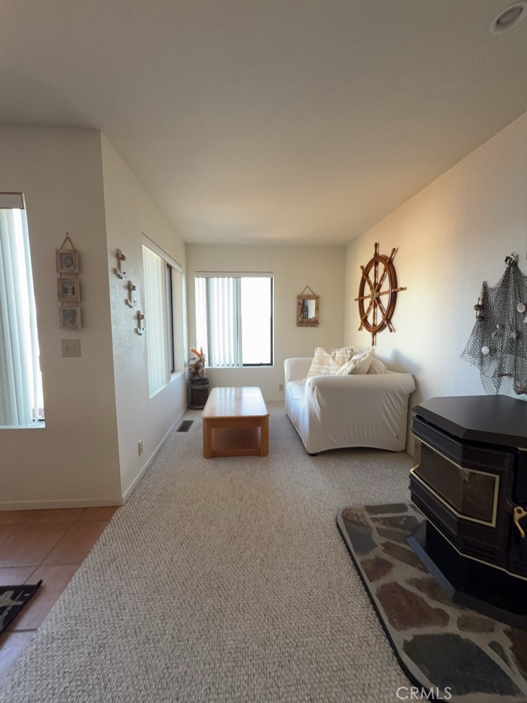 4816 Marina Drive Kelseyville, CA 95451 - Photo 15 of 28 a living room with furniture and a fireplace