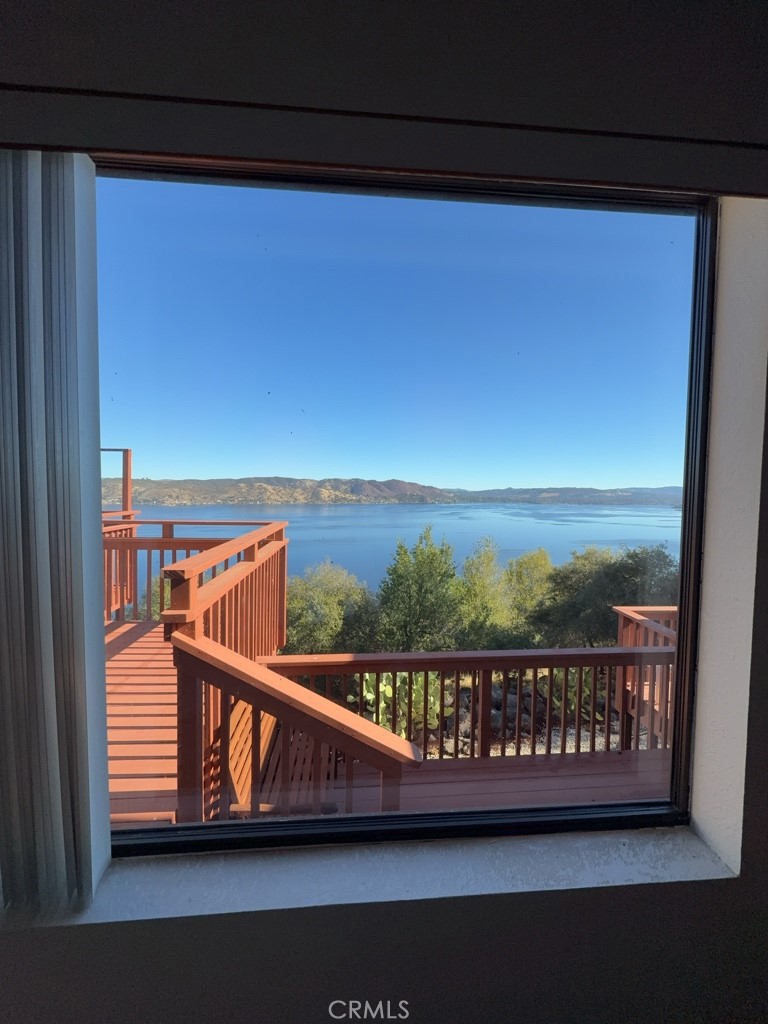 4816 Marina Drive Kelseyville, CA 95451 - Photo 28 of 28 a view of a balcony with wooden floor and outdoor space