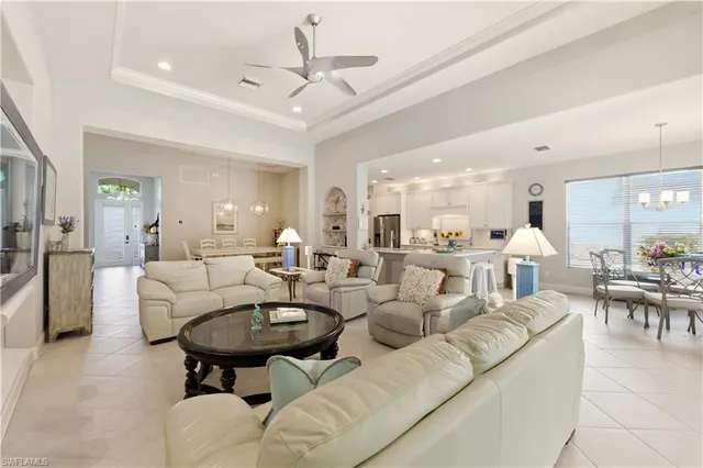 a large bathroom with a granite countertop tub sink and mirror