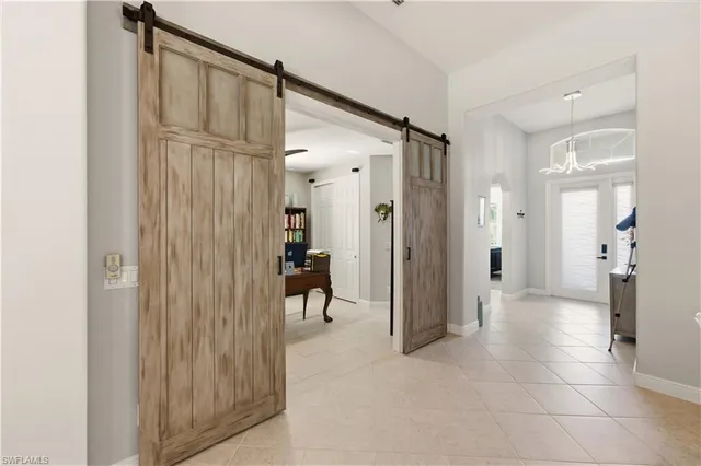 a kitchen with counter top space sink stove and cabinets