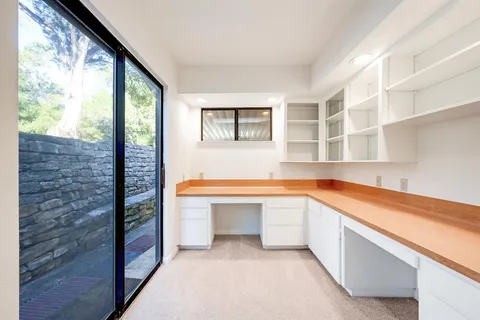 a view of a bathroom with a sink and a bathtub