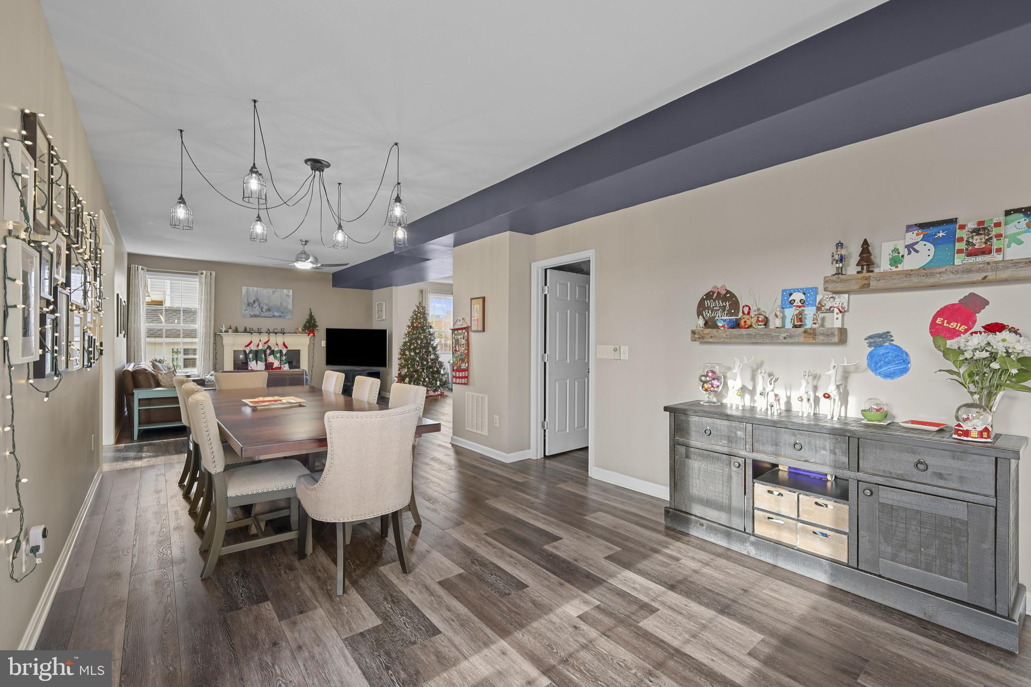 4220 Kings Road Edgewater, MD 21037 - Photo 27 of 78 a view of a dining room with furniture and wooden floor