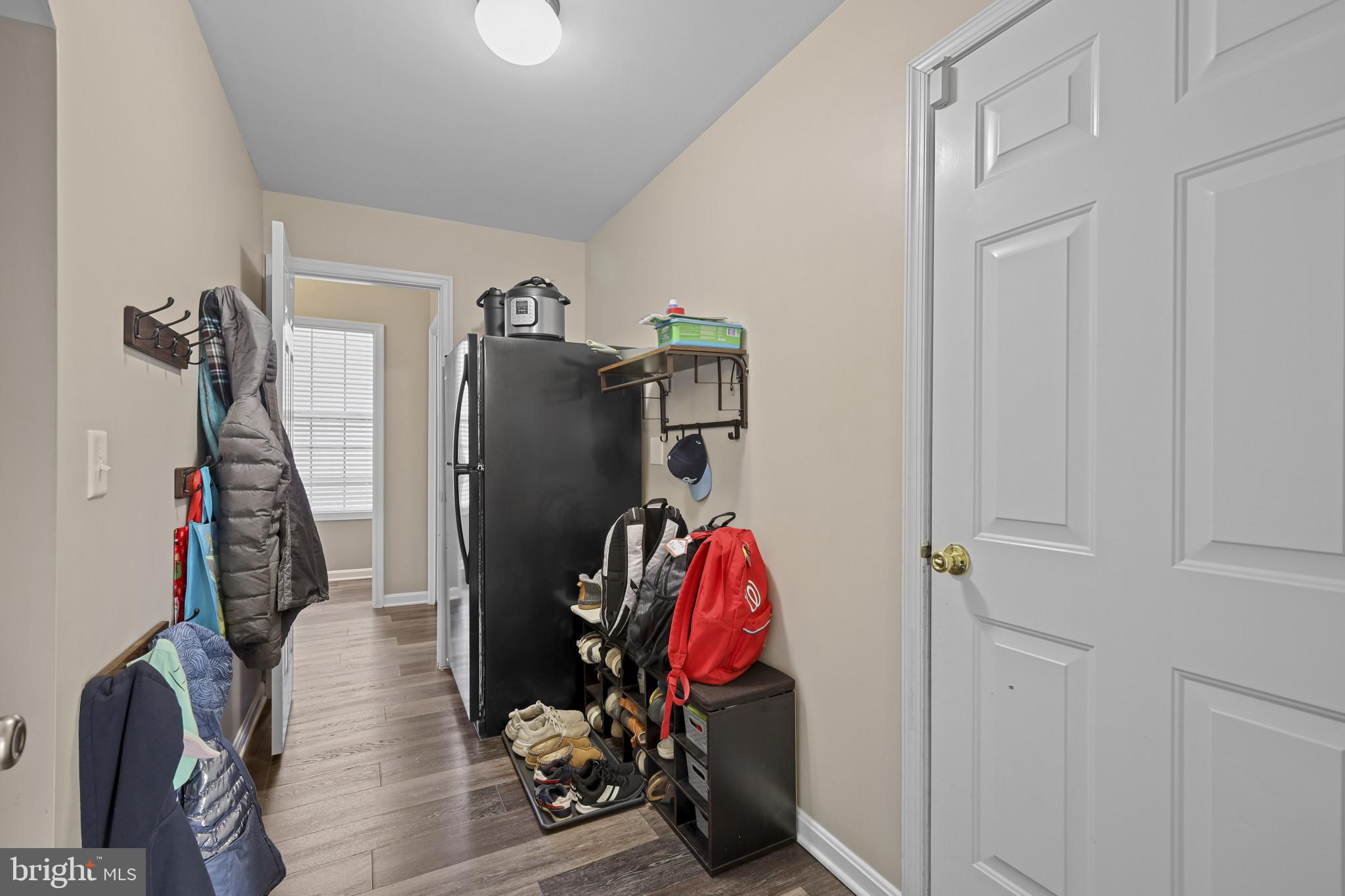 4220 Kings Road Edgewater, MD 21037 - Photo 28 of 78 a view of walk in closet with clothes and shoes