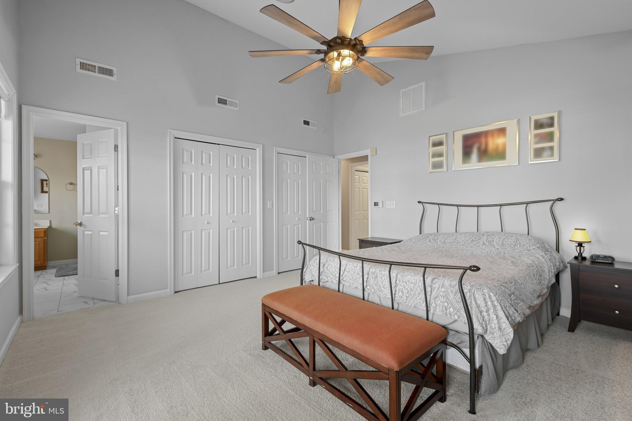 4220 Kings Road Edgewater, MD 21037 - Photo 36 of 78 a bedroom with a bed a table and chair