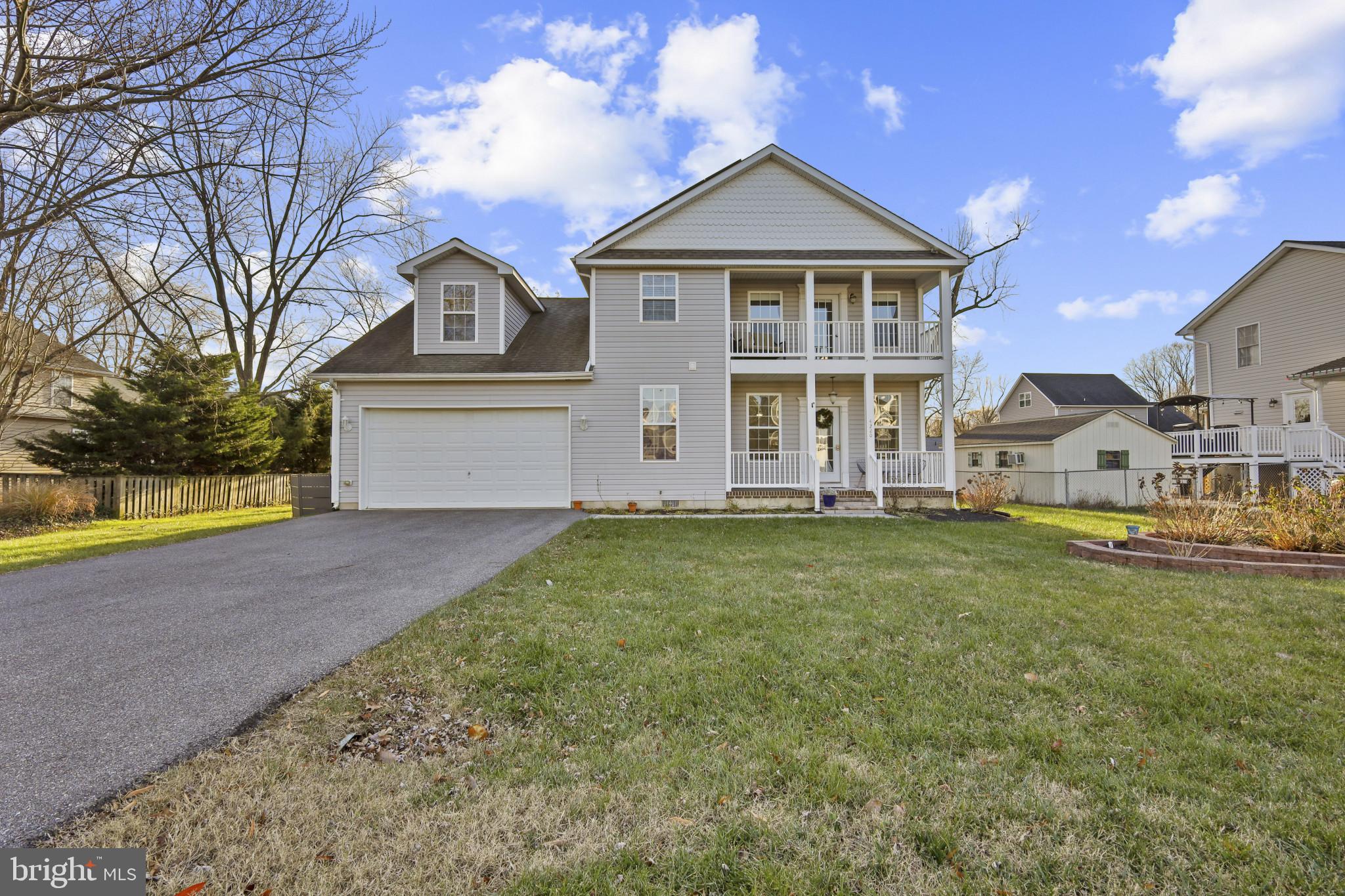 4220 Kings Road Edgewater, MD 21037 - Photo 4 of 78 a front view of a house with a yard
