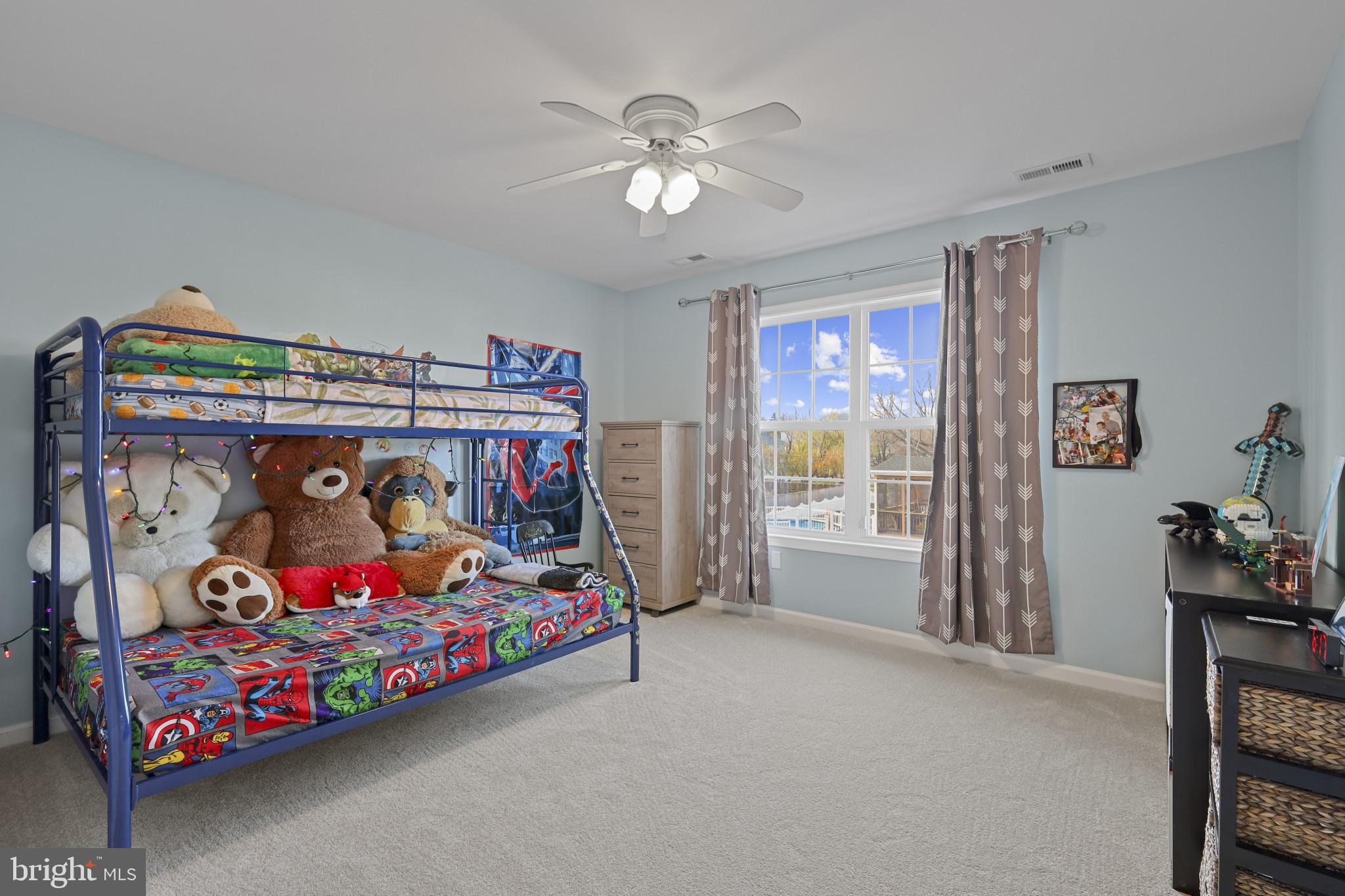 4220 Kings Road Edgewater, MD 21037 - Photo 47 of 78 a bedroom with bed and a baby bed