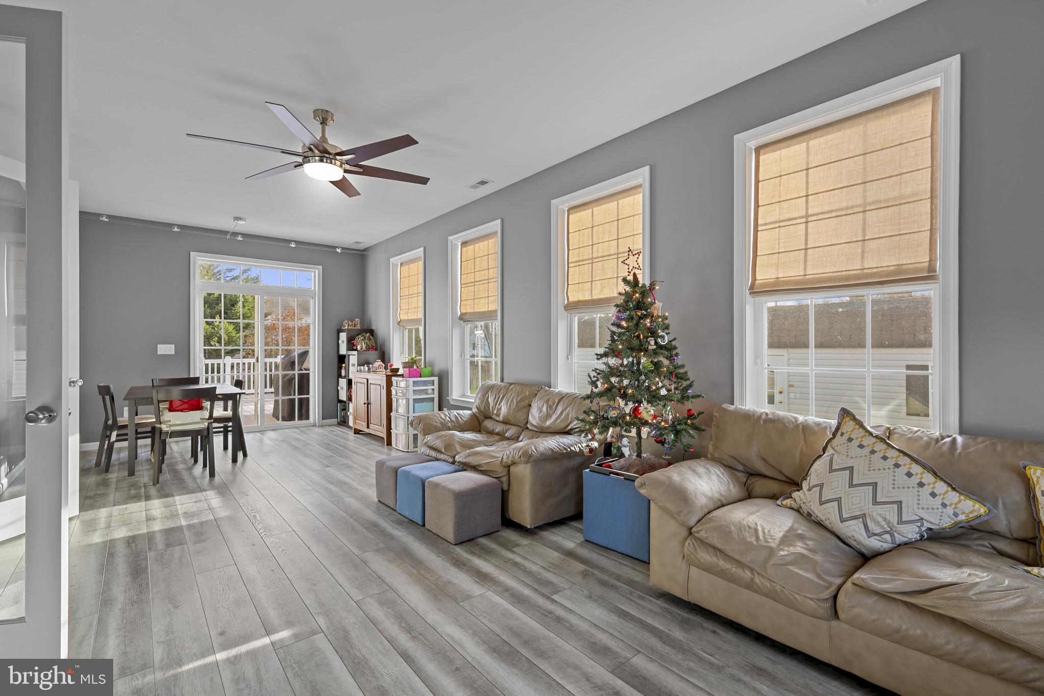 4220 Kings Road Edgewater, MD 21037 - Photo 52 of 78 a living room with furniture and a large window
