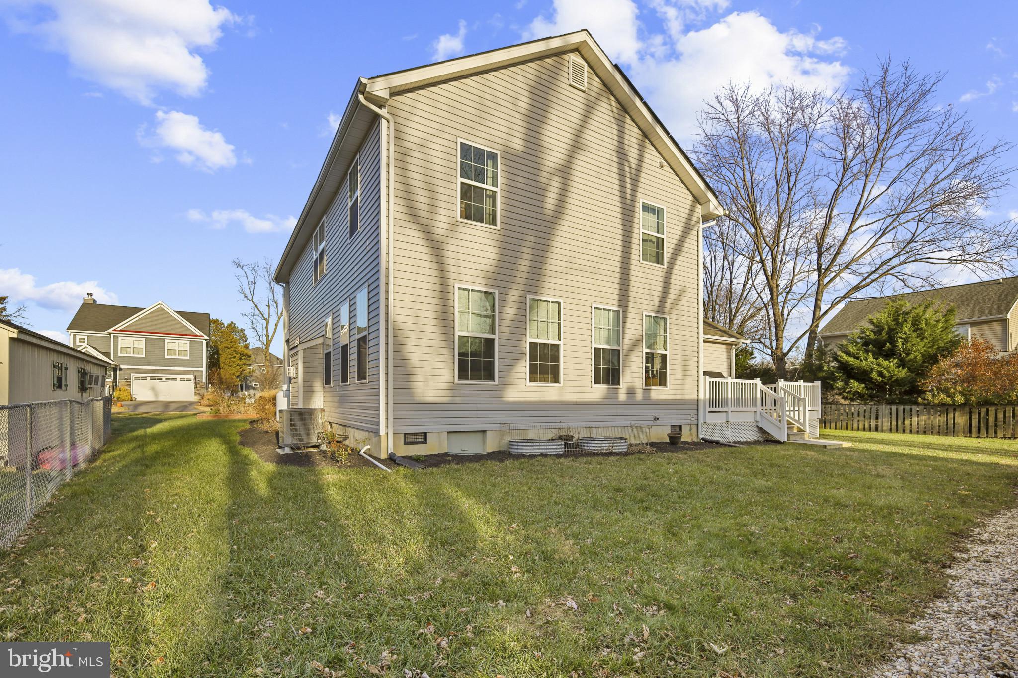 4220 Kings Road Edgewater, MD 21037 - Photo 56 of 78 a view of a house with a yard and sitting area