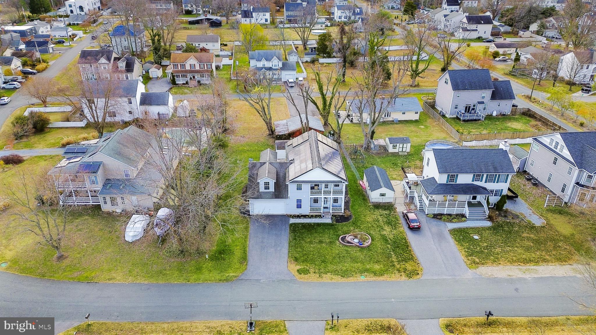 4220 Kings Road Edgewater, MD 21037 - Photo 59 of 78 an aerial view of residential houses with swimming pool