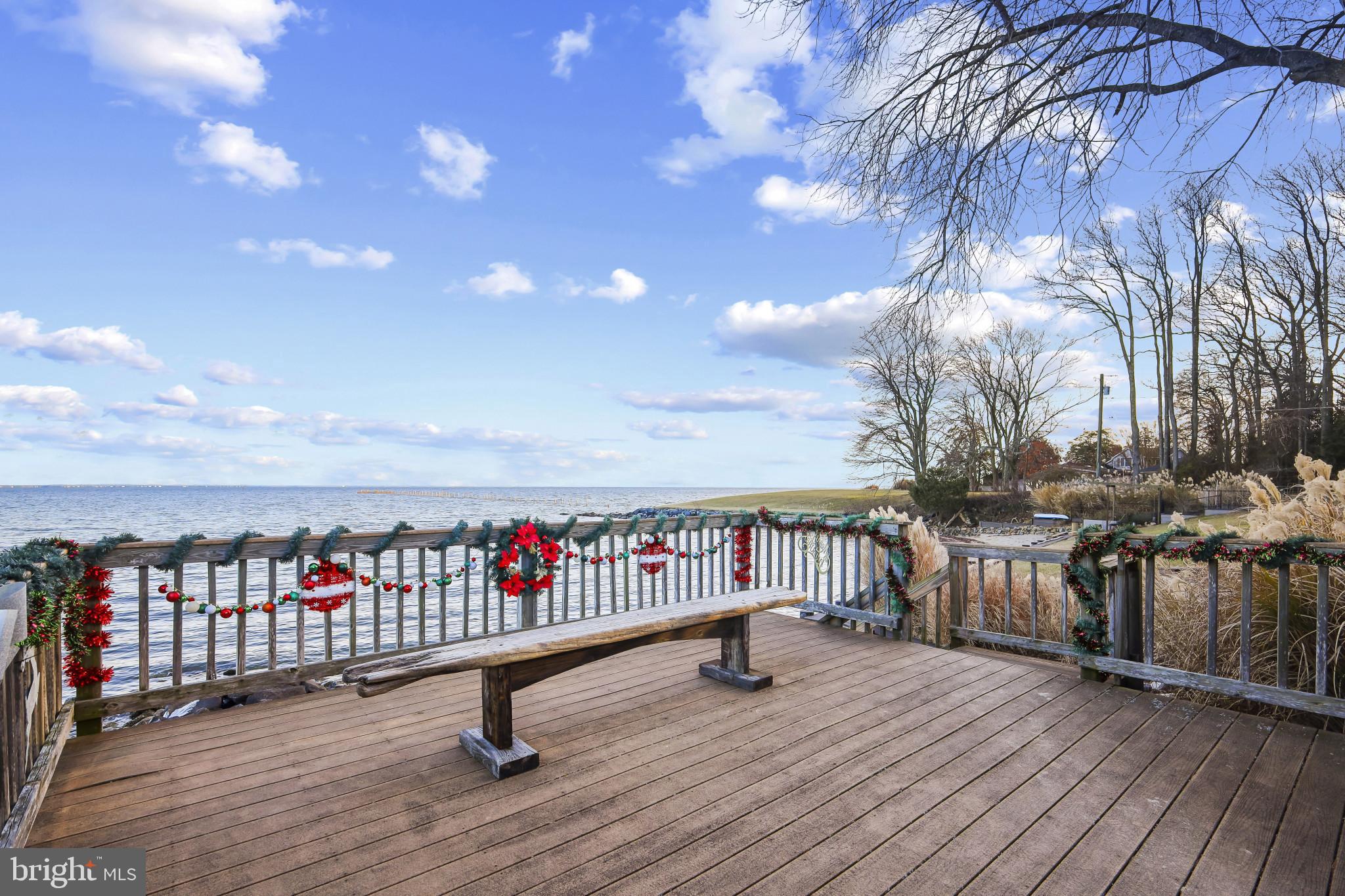 4220 Kings Road Edgewater, MD 21037 - Photo 72 of 78 Serene lakeside deck adorned for the season.