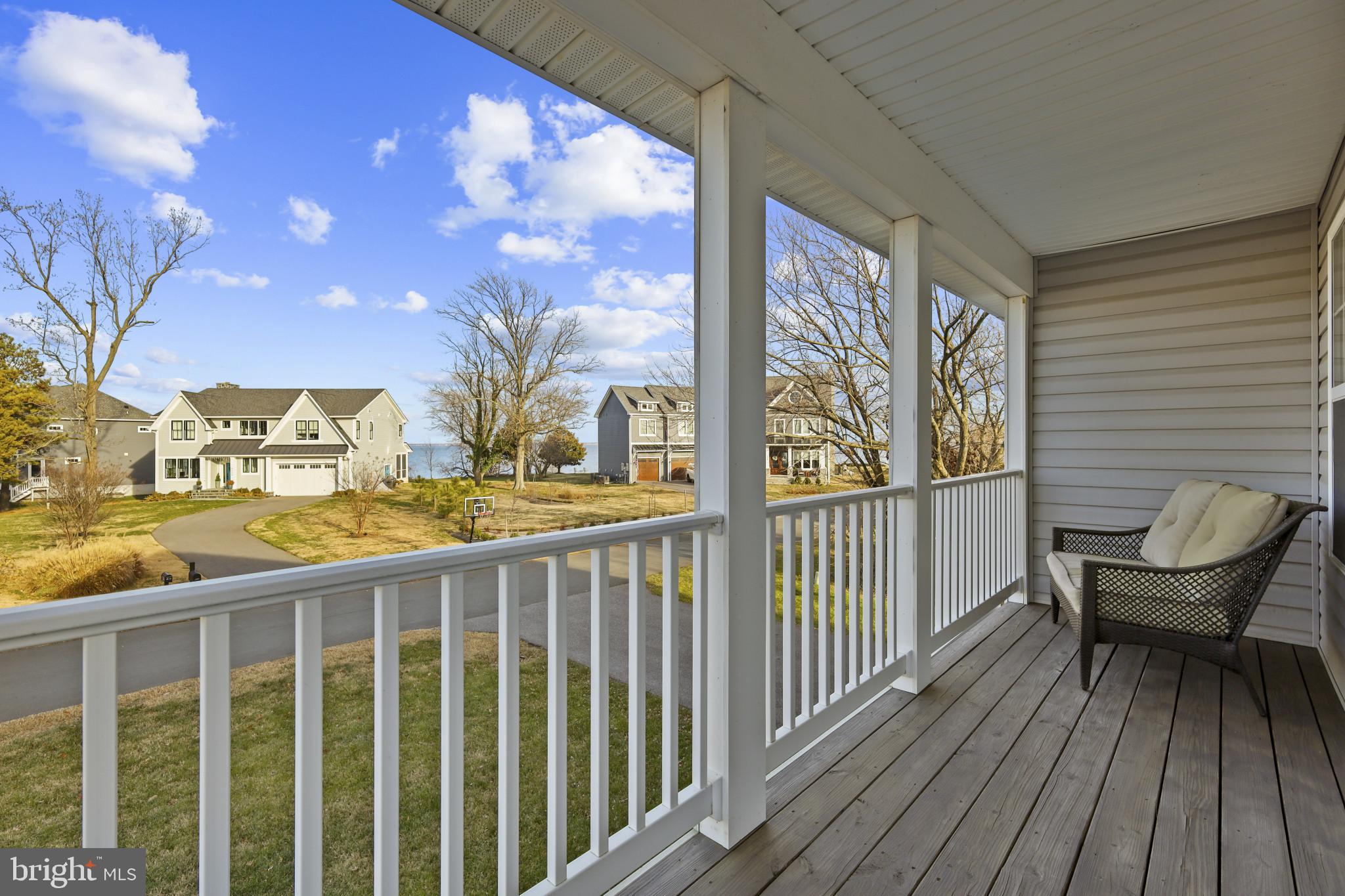 4220 Kings Road Edgewater, MD 21037 - Photo 8 of 78 a view of a chairs on the roof deck
