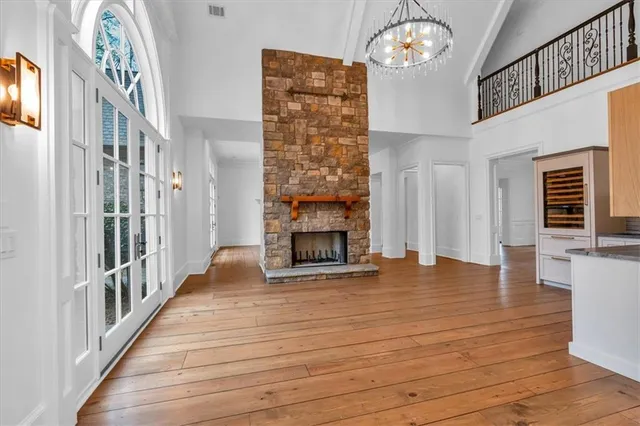 a stove top oven sitting inside of a kitchen