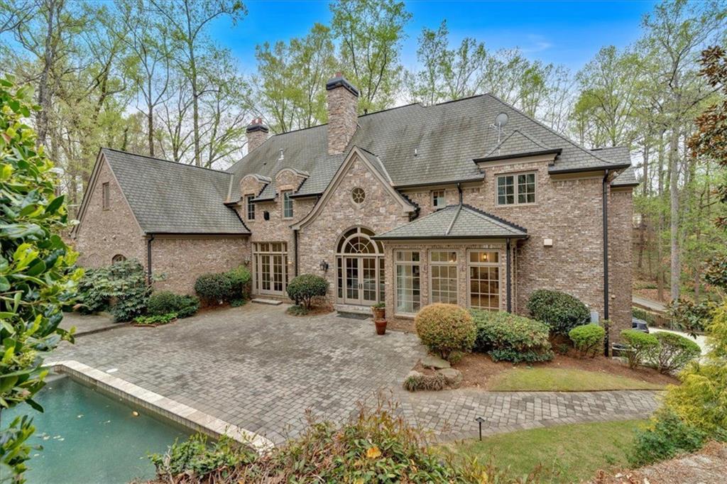 115 Mount Paran Ridge Atlanta, GA 30327 - Photo 3 of 85 front view of a house with a yard