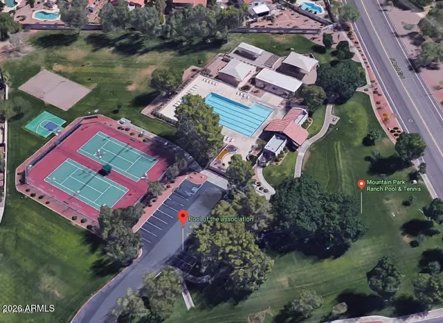 an aerial view of a house with a lake view