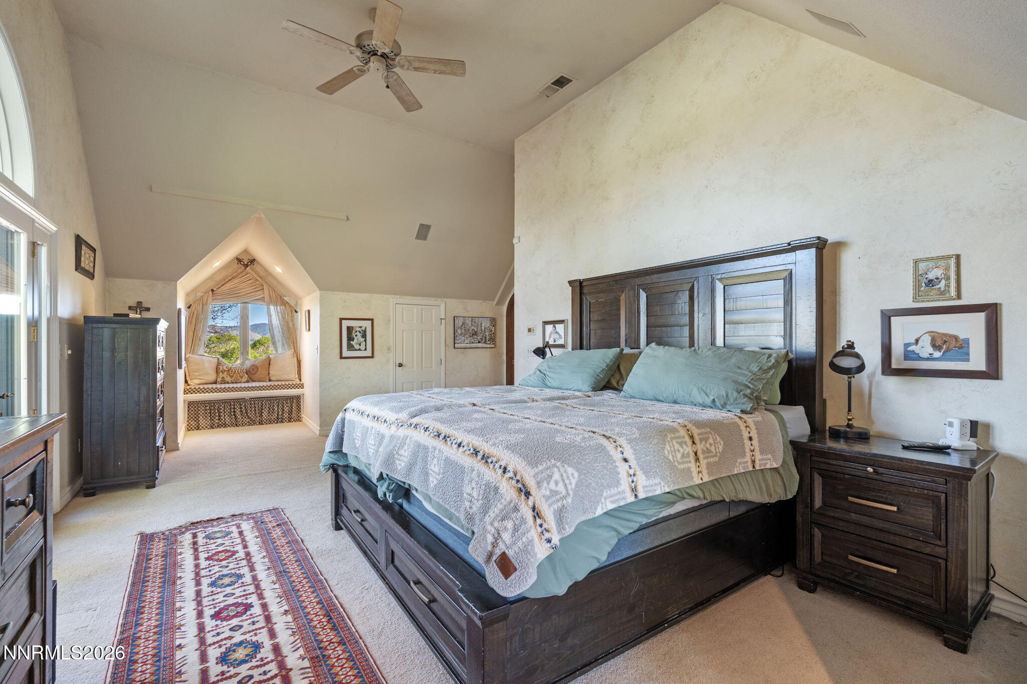 7850 Kevin Circle Reno, NV 89511 - Photo 19 of 68 a bedroom with a large bed and a window