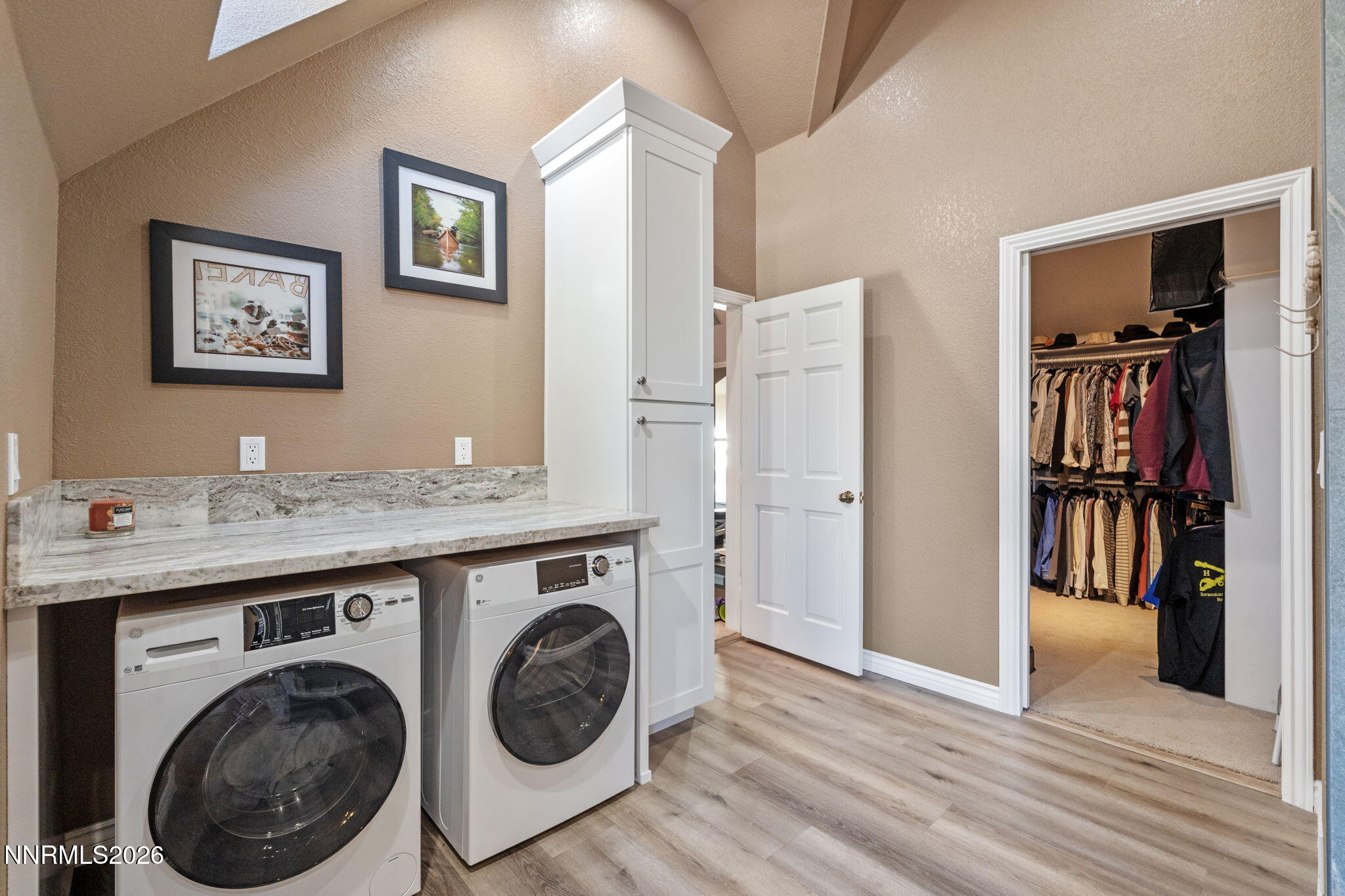 7850 Kevin Circle Reno, NV 89511 - Photo 25 of 68 a view of a kitchen with washer and dryer