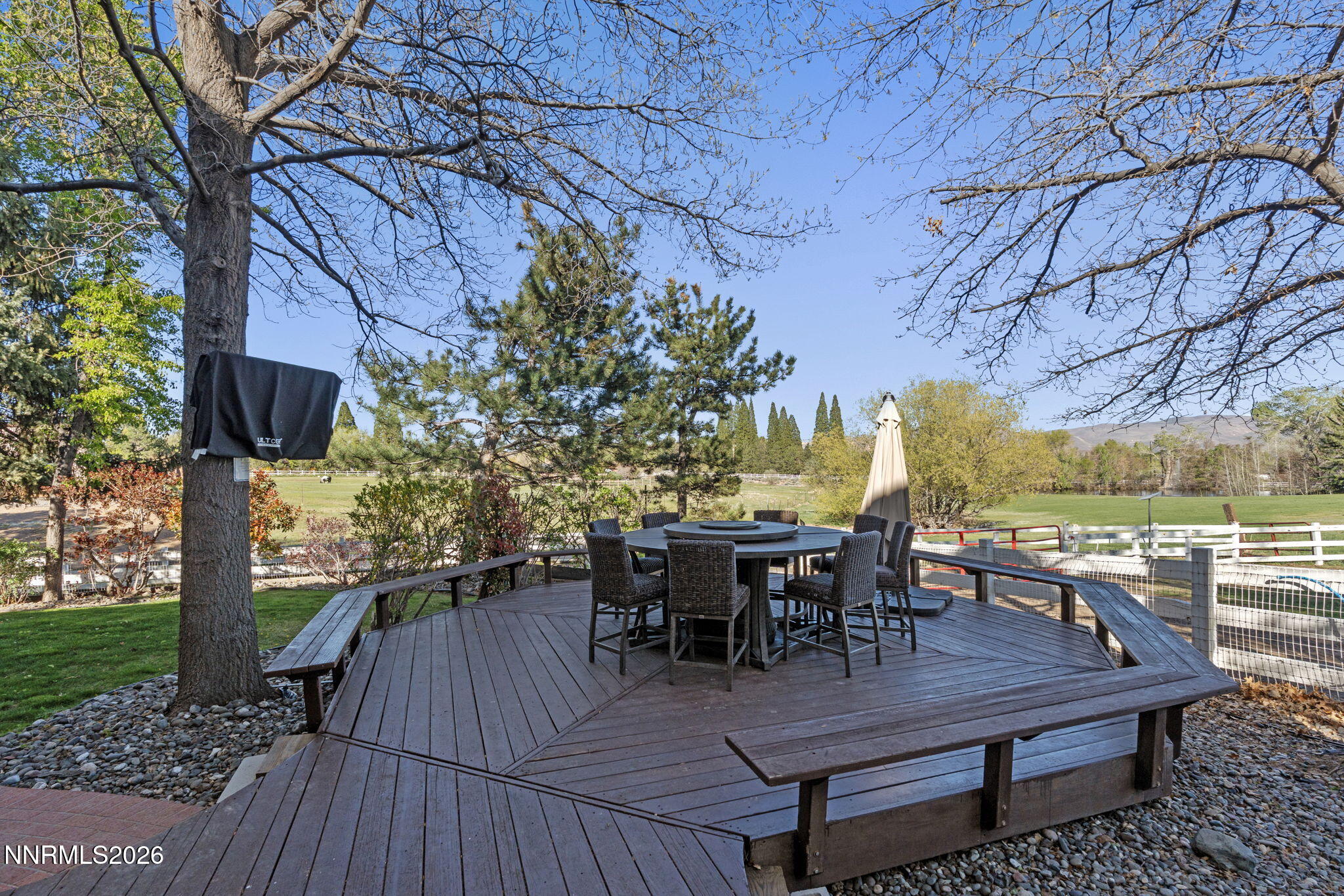 7850 Kevin Circle Reno, NV 89511 - Photo 43 of 68 a view of a dinning table and chairs in patio of the house