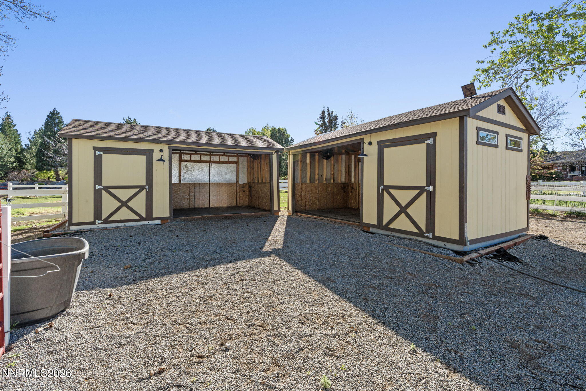 7850 Kevin Circle Reno, NV 89511 - Photo 51 of 68 a front view of a house with a yard and garage