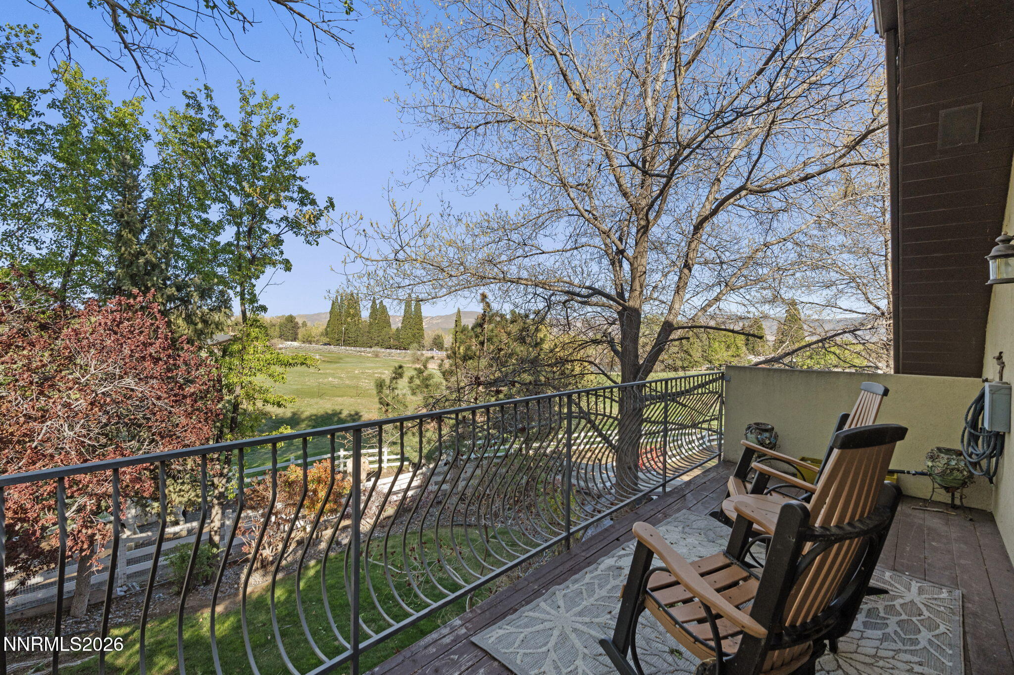 7850 Kevin Circle Reno, NV 89511 - Photo 57 of 68 a view of a balcony with wooden floor and fence