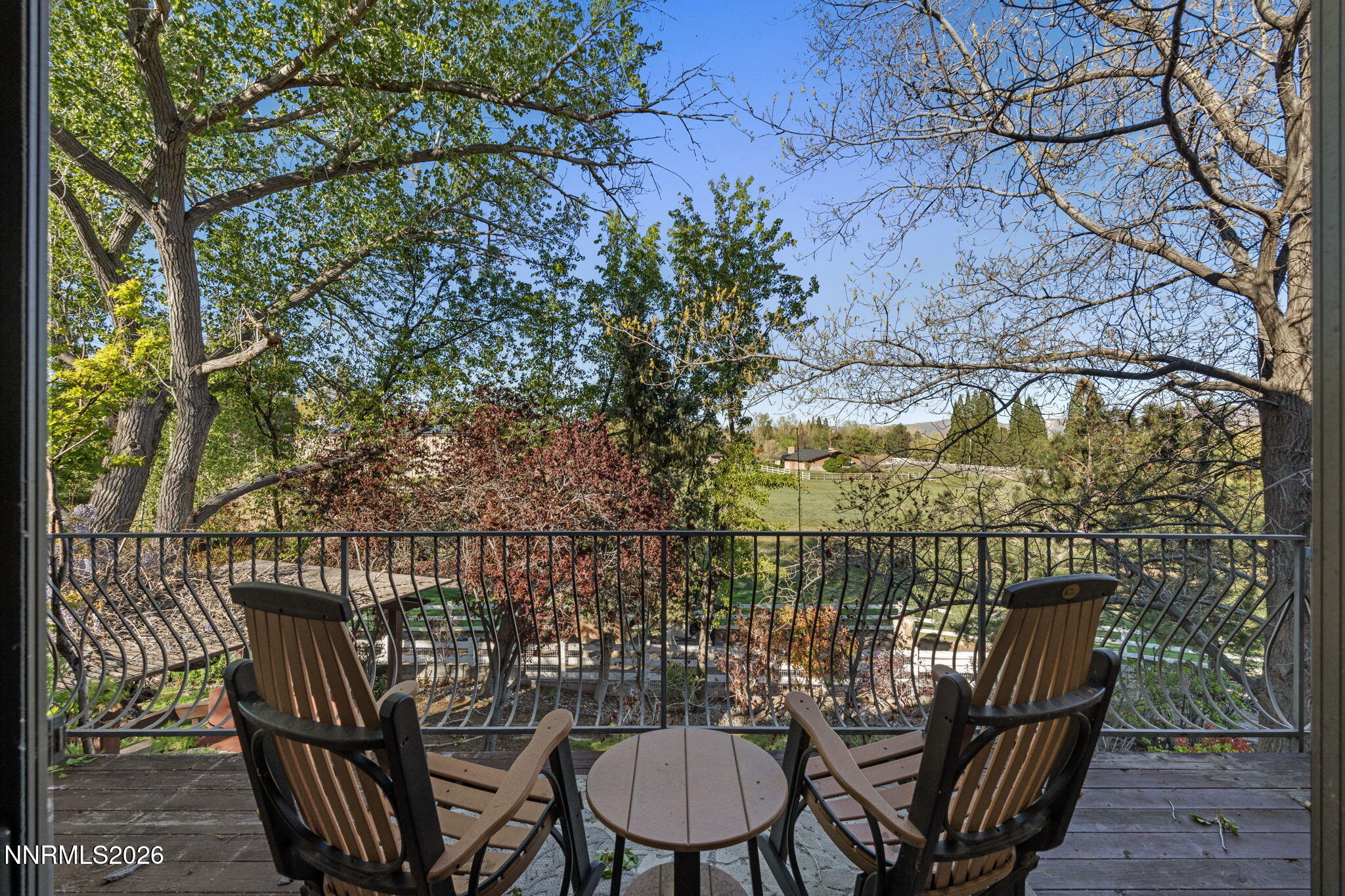 7850 Kevin Circle Reno, NV 89511 - Photo 58 of 68 a view of a balcony with two chairs and a table
