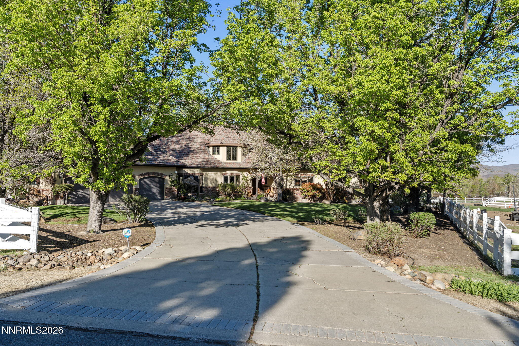 7850 Kevin Circle Reno, NV 89511 - Photo 66 of 68 a front view of a house with a yard