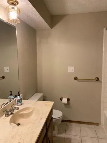 a view of a yard with trees