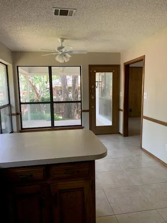 a view of a kitchen with a sink and dishwasher
