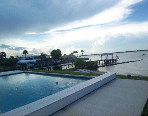 260 Southeast Cardinal Way Stuart, FL 34996 - Photo 3 of 8 a view of swimming pool with furniture