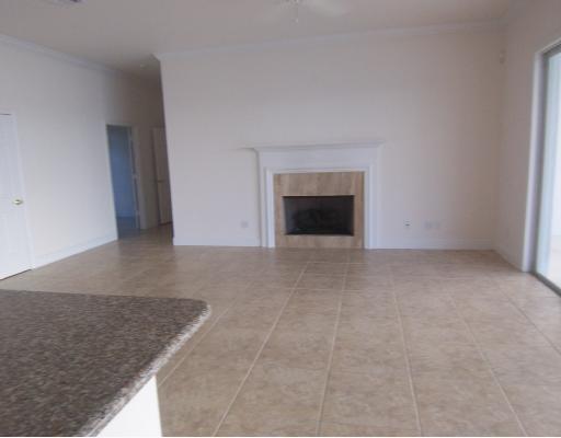 260 Southeast Cardinal Way Stuart, FL 34996 - Photo 5 of 8 an empty room with windows