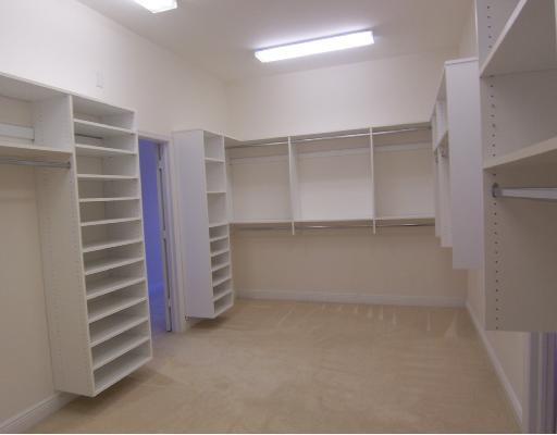 260 Southeast Cardinal Way Stuart, FL 34996 - Photo 8 of 8 a view of an empty room with stairs