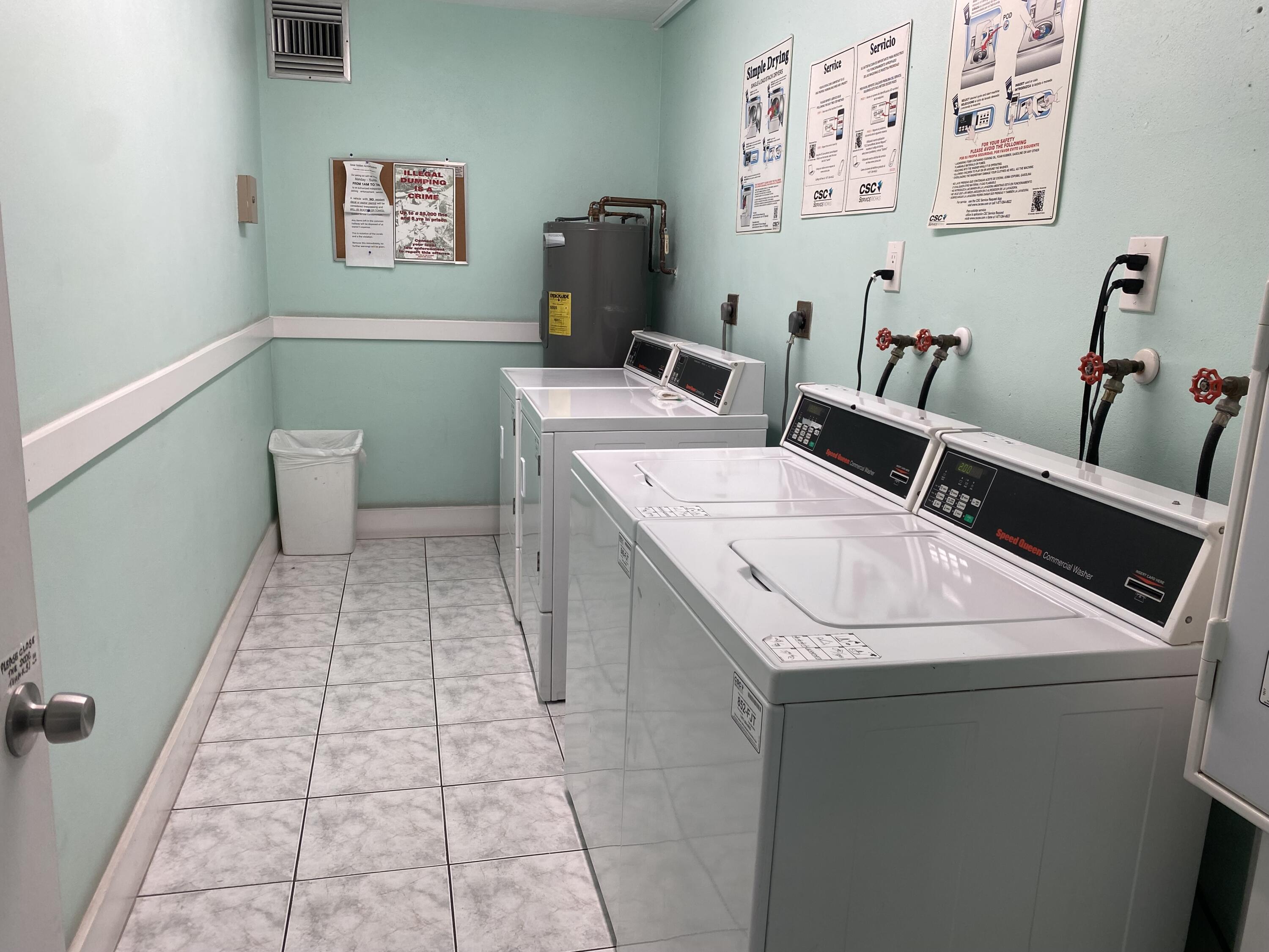 298 Southwest 6th Street, Unit 109 Boca Raton, FL 33432 - Photo 25 of 28 a bathroom with a sink toilet and a mirror