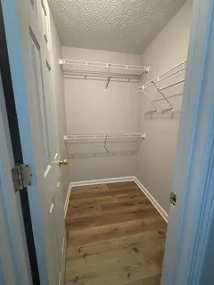 a view of a room with racks on the wall