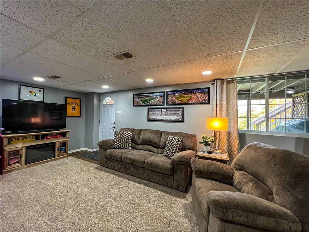 139 Delaware Drive Butler, PA 16001 - Photo 13 of 27 a living room with furniture and a flat screen tv
