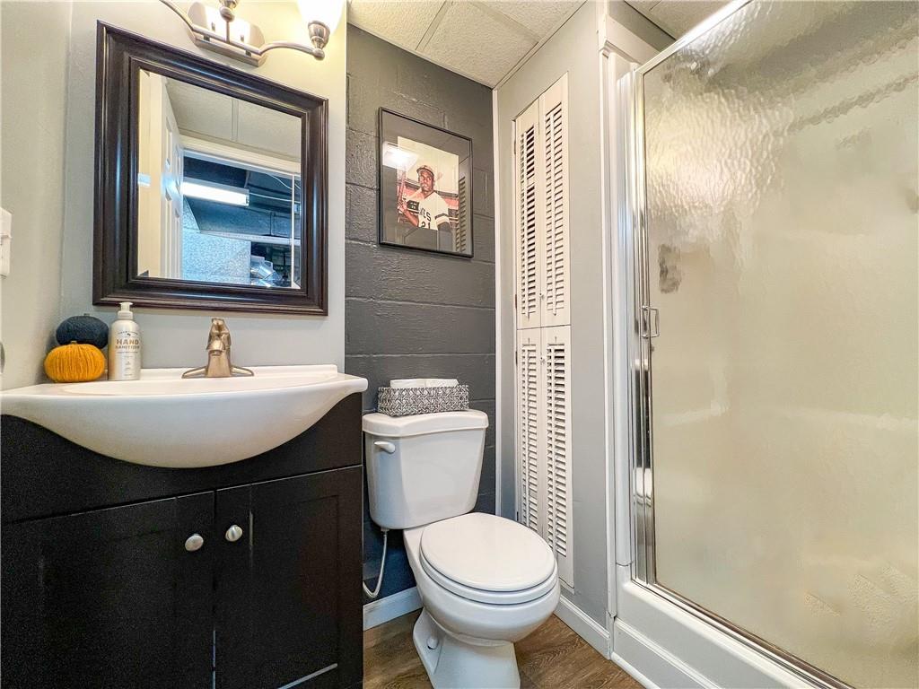 139 Delaware Drive Butler, PA 16001 - Photo 15 of 27 a bathroom with a sink toilet and mirror
