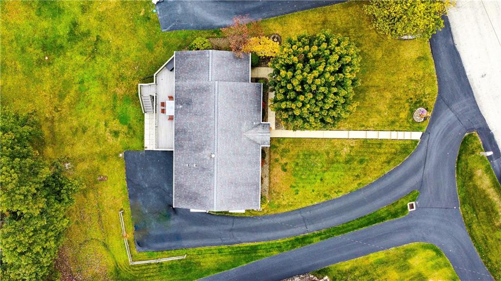 139 Delaware Drive Butler, PA 16001 - Photo 26 of 27 a view of a swimming pool with a outdoor seating