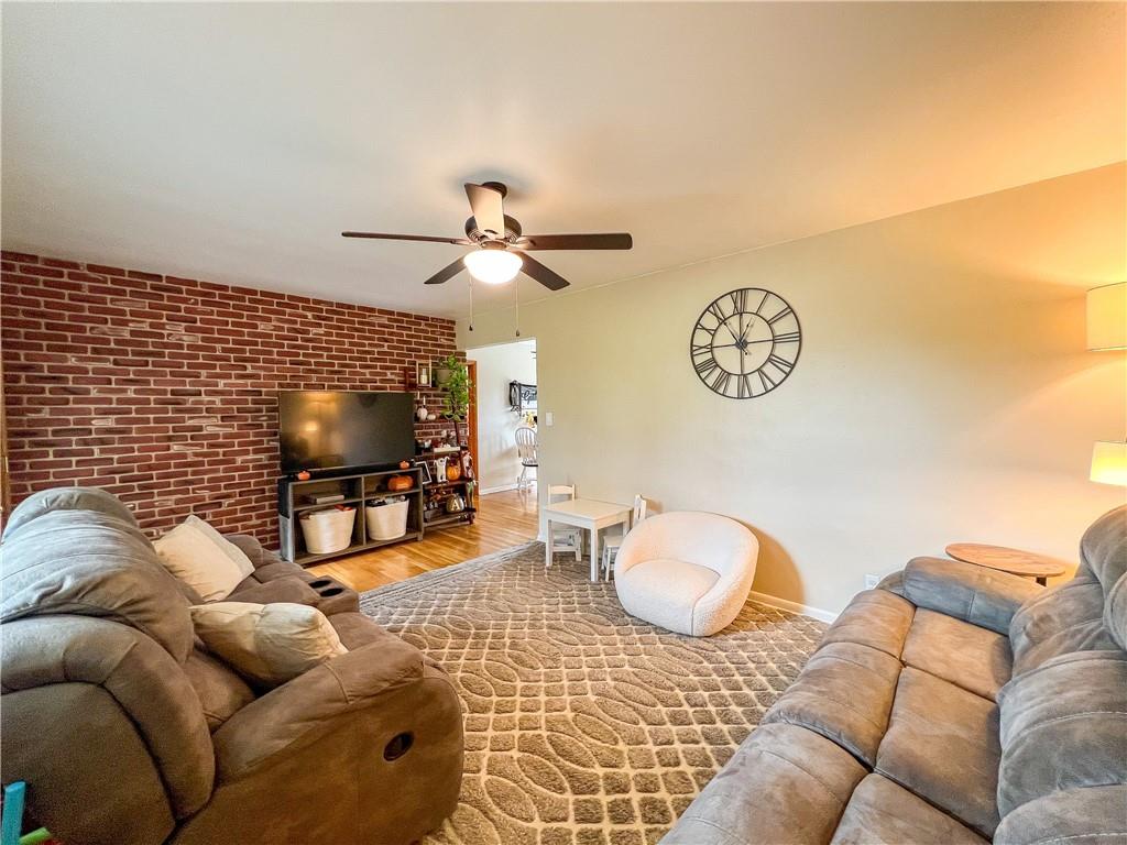 139 Delaware Drive Butler, PA 16001 - Photo 3 of 27 a living room with furniture and a flat screen tv
