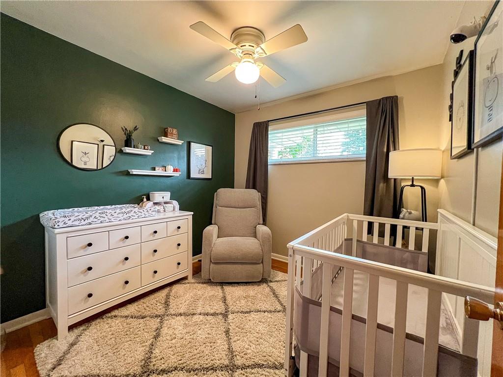 139 Delaware Drive Butler, PA 16001 - Photo 9 of 27 a bedroom with furniture and a window