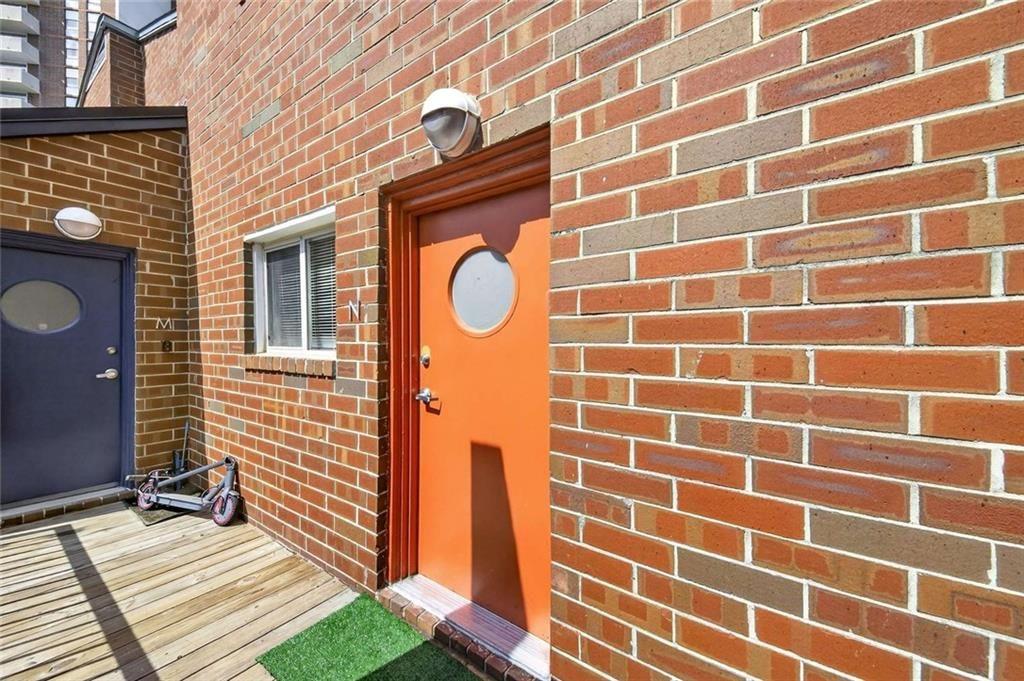 377 Ralph McGill Boulevard Northeast, Unit N Atlanta, GA 30312 - Photo 1 of 41 a brick building with a sink and a window