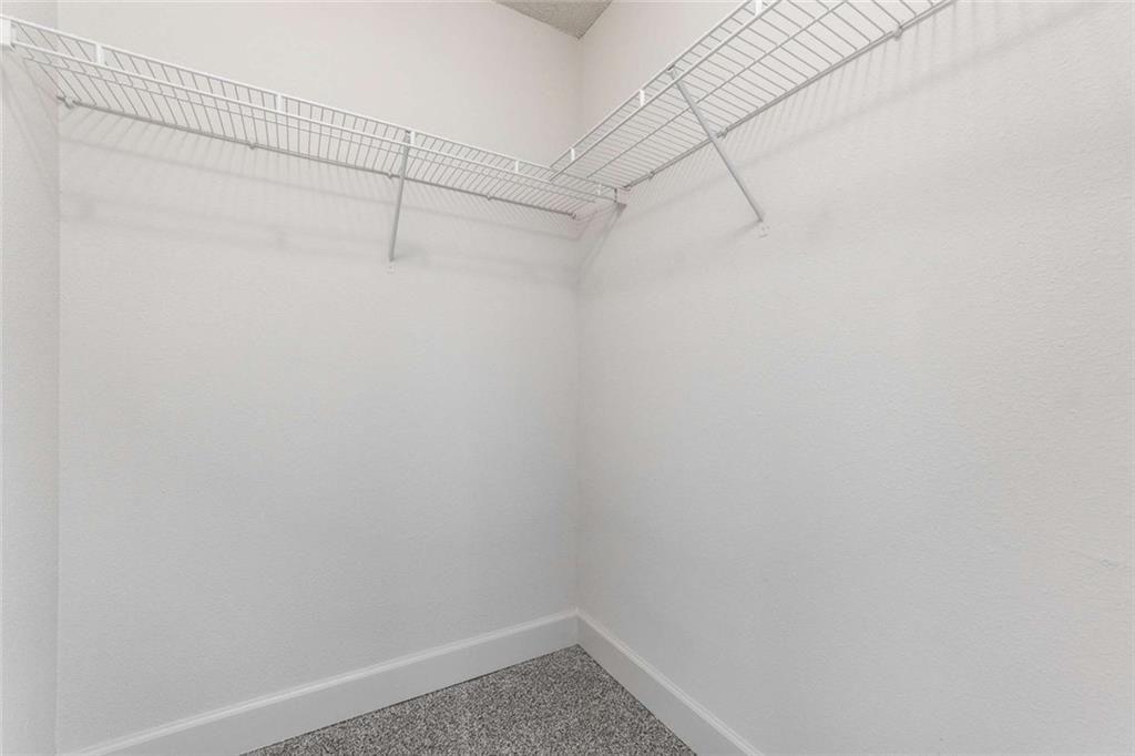 377 Ralph McGill Boulevard Northeast, Unit N Atlanta, GA 30312 - Photo 22 of 41 a view of a room with racks on the wall