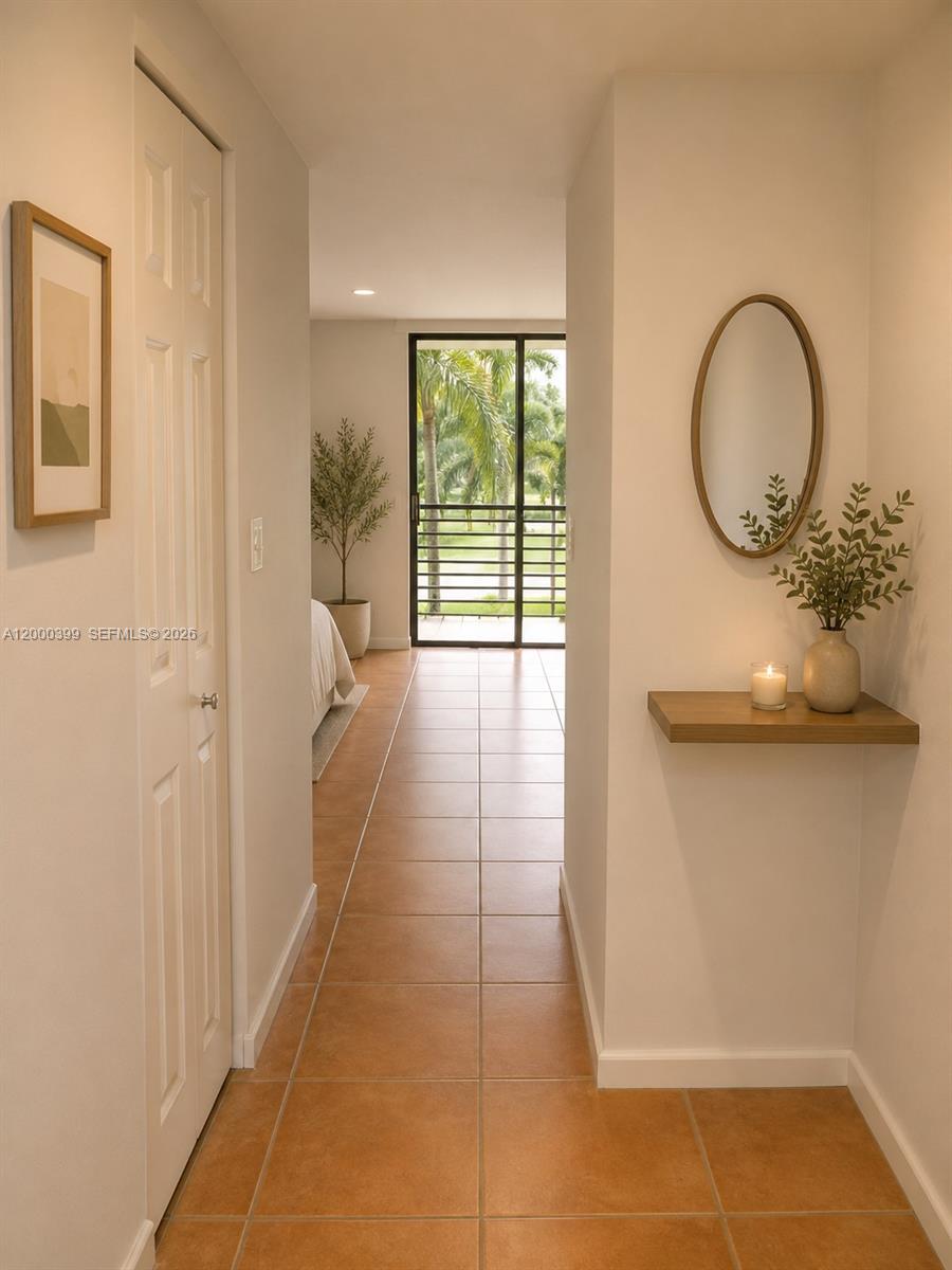 8050 West McNab Road, Unit 206 Tamarac, FL 33321 - Photo 14 of 37 a view of a room with wooden floor and windows