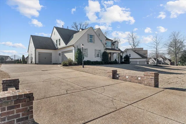 a front view of a house with a garage