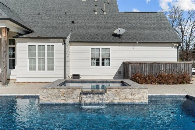 a view of house with yard