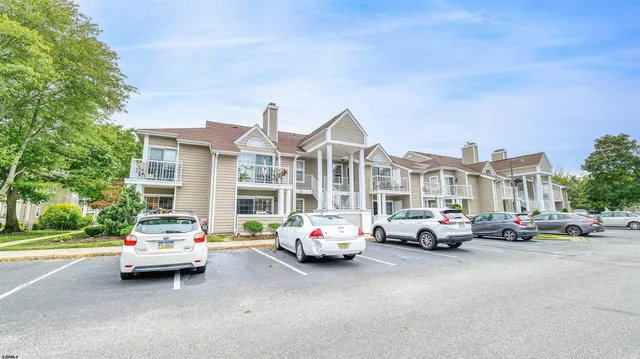 a cars parked in front of a building
