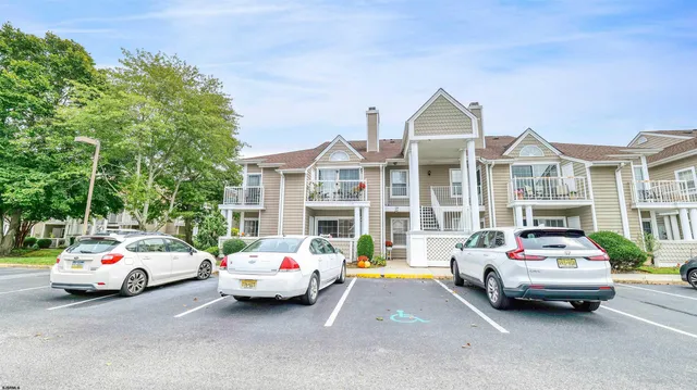 a car parked in front of a house