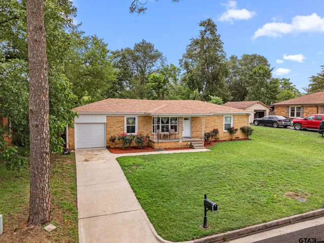 a aerial view of a house with garden