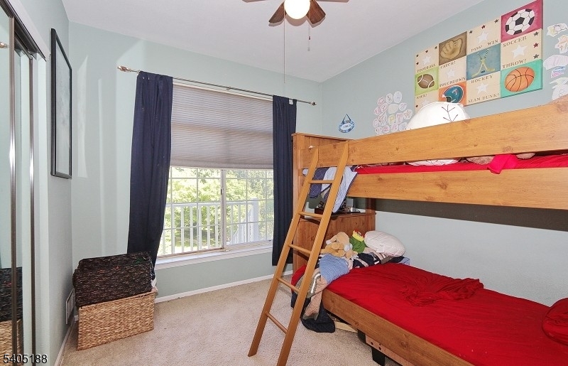 58 Wescott Road Bedminster, NJ 07921 - Photo 12 of 13 a room with gym equipment and a window
