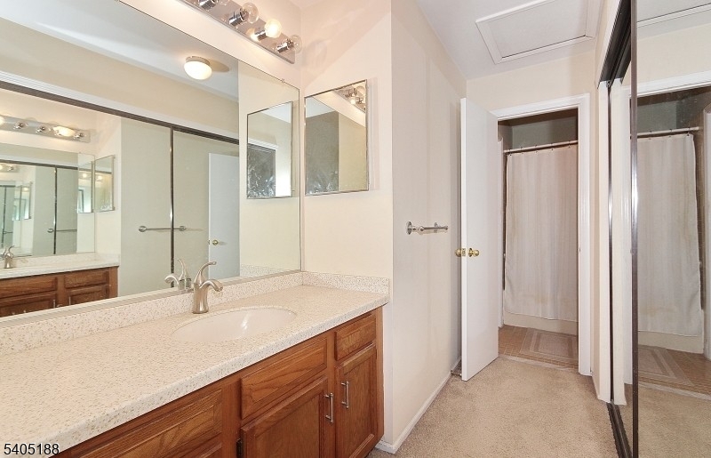 58 Wescott Road Bedminster, NJ 07921 - Photo 10 of 13 a bathroom with a sink and a mirror