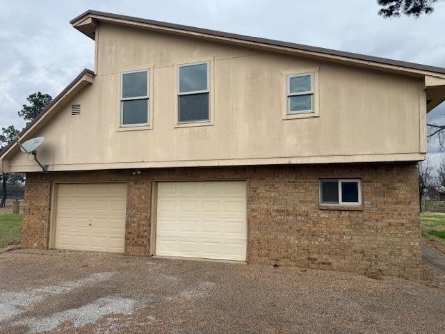 303 New Highland Road Springtown, TX 76082 - Photo 3 of 19 a front view of a house
