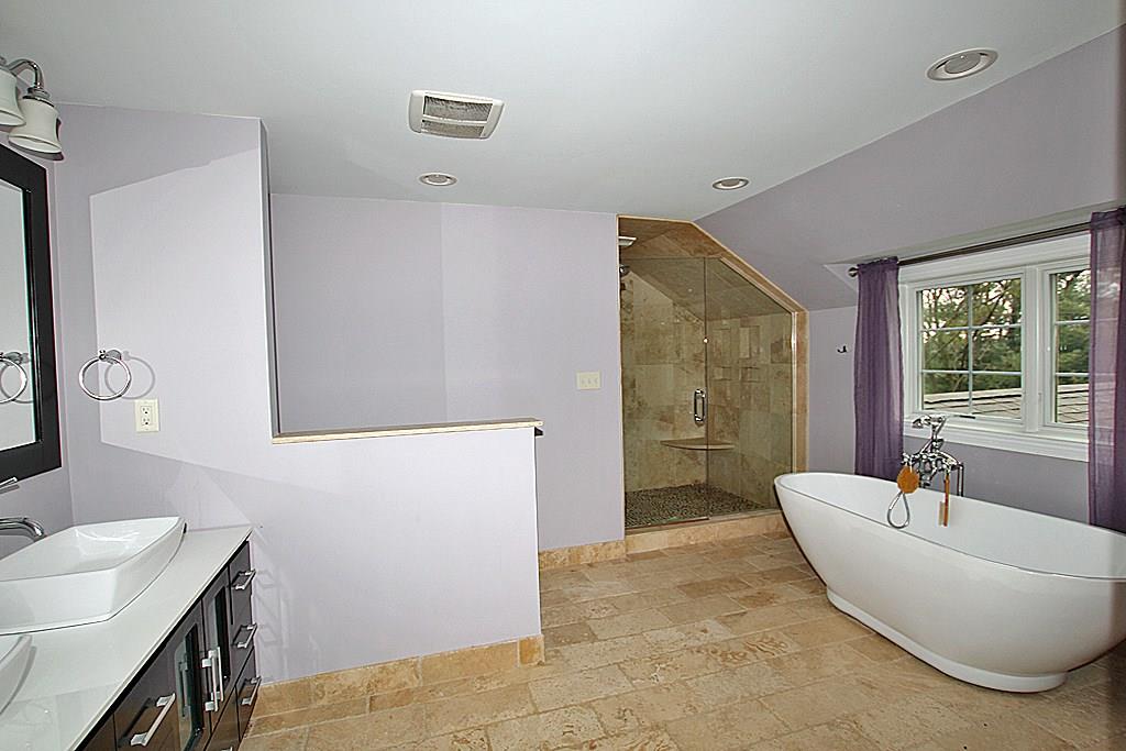 764 Osage Road Mt. Lebanon, PA 15243 - Photo 13 of 24 Walkin shower with a stone floor and a free standing soaking tub. Also a heated floor.